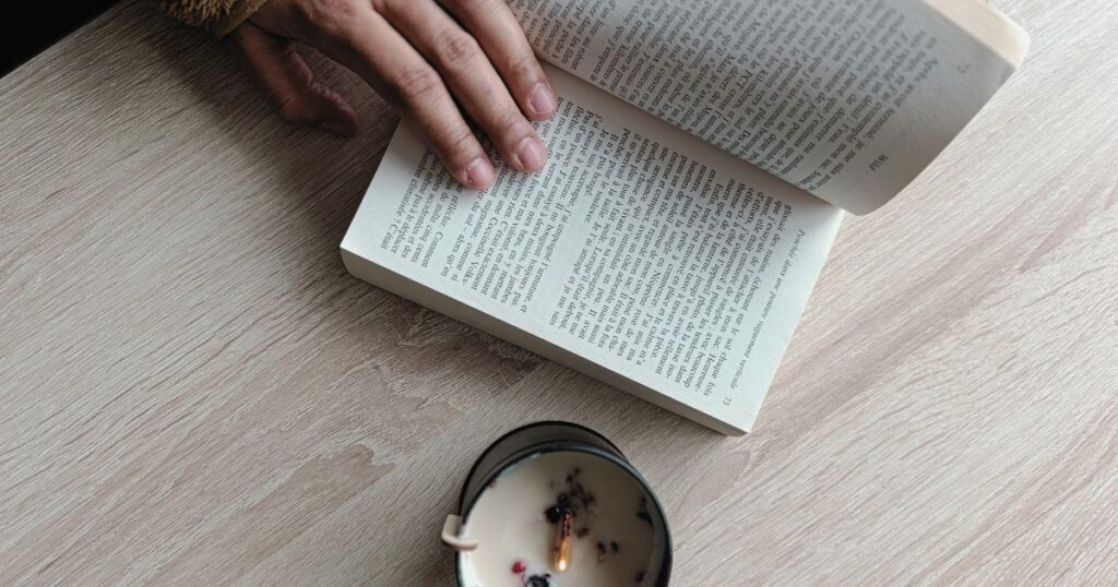quiet evening routine with book and candle